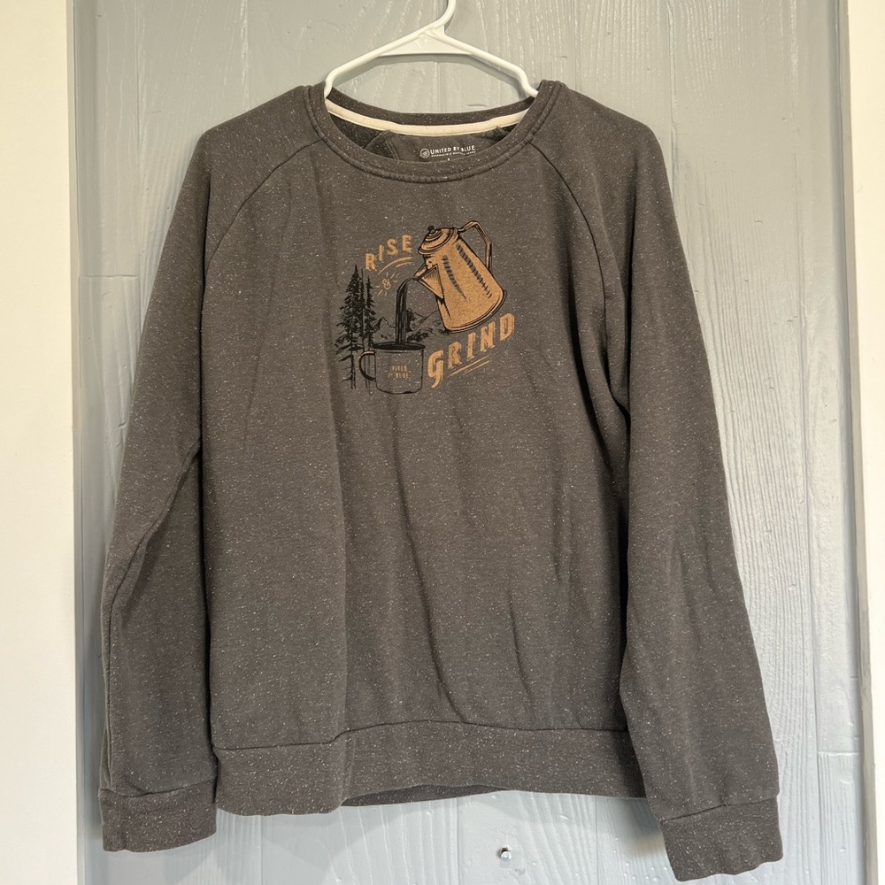 United by blue sweater